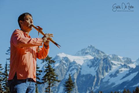 Peter Ali playing native flute