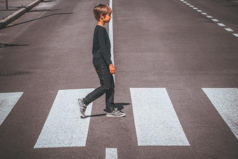 boy in crosswalk