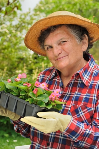 older woman gardening