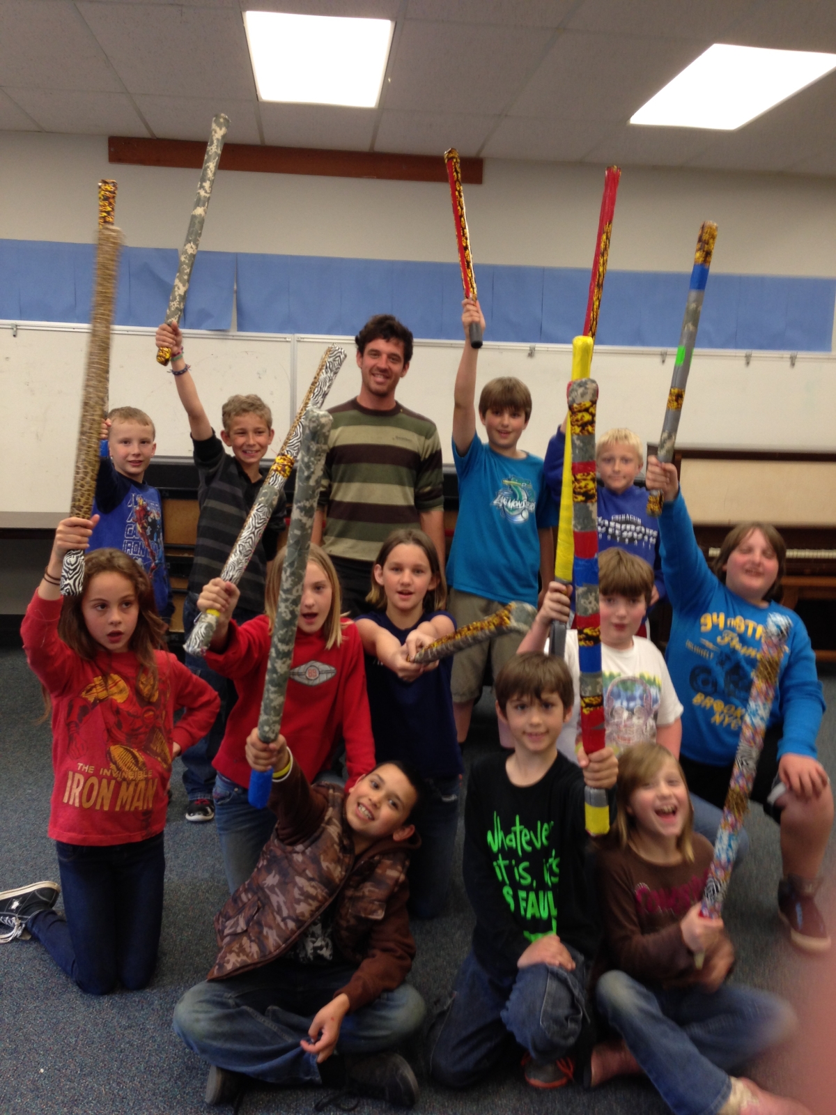 Group of teens wielding play swords