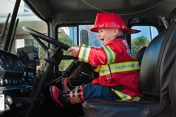 Boy dressed as a fireman