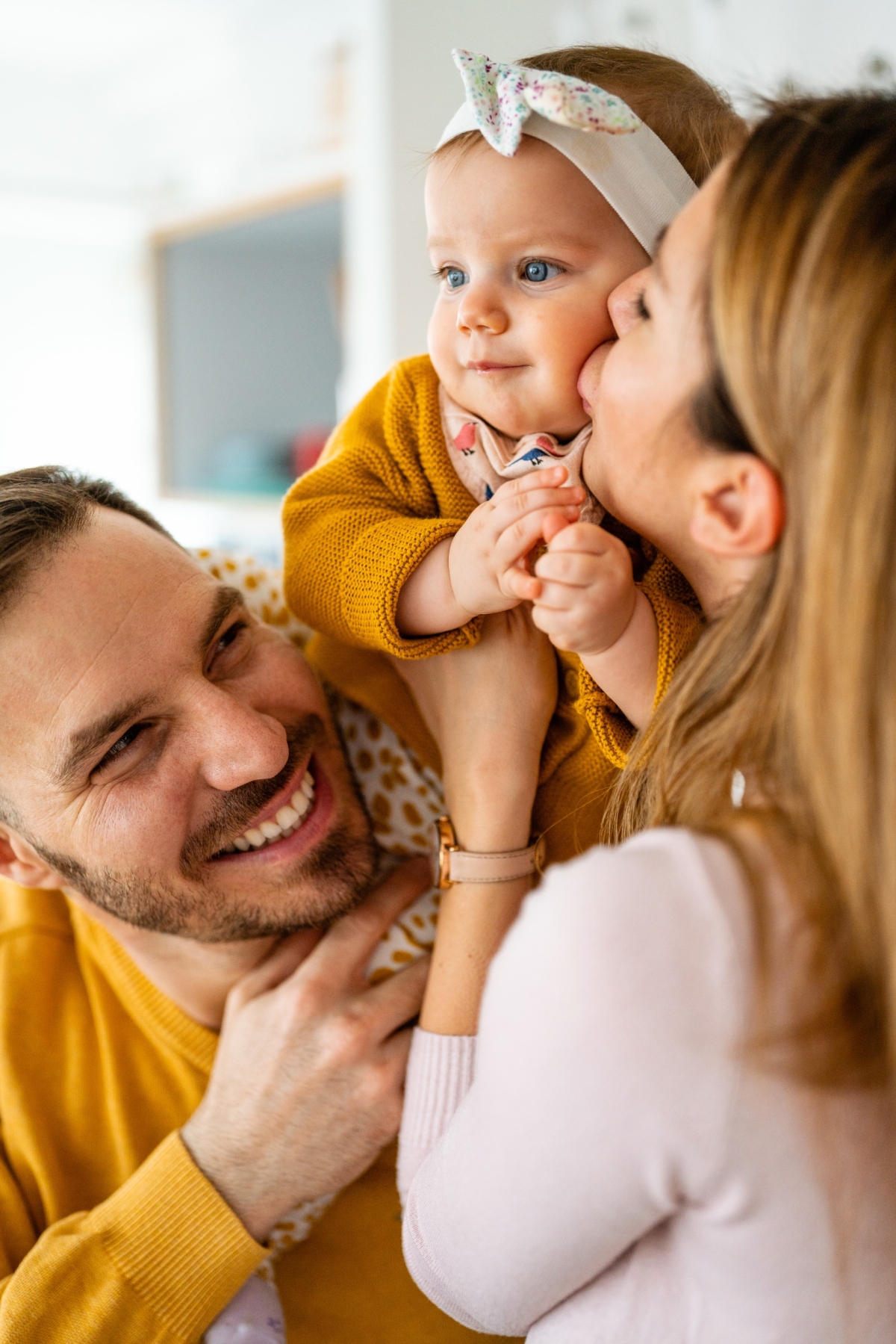 Cute baby with parents